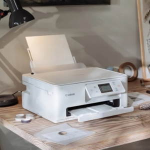 Witte Canon printer op een bureau